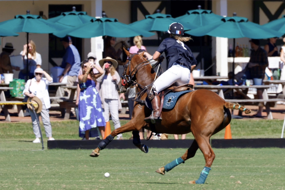 Emma playing polo